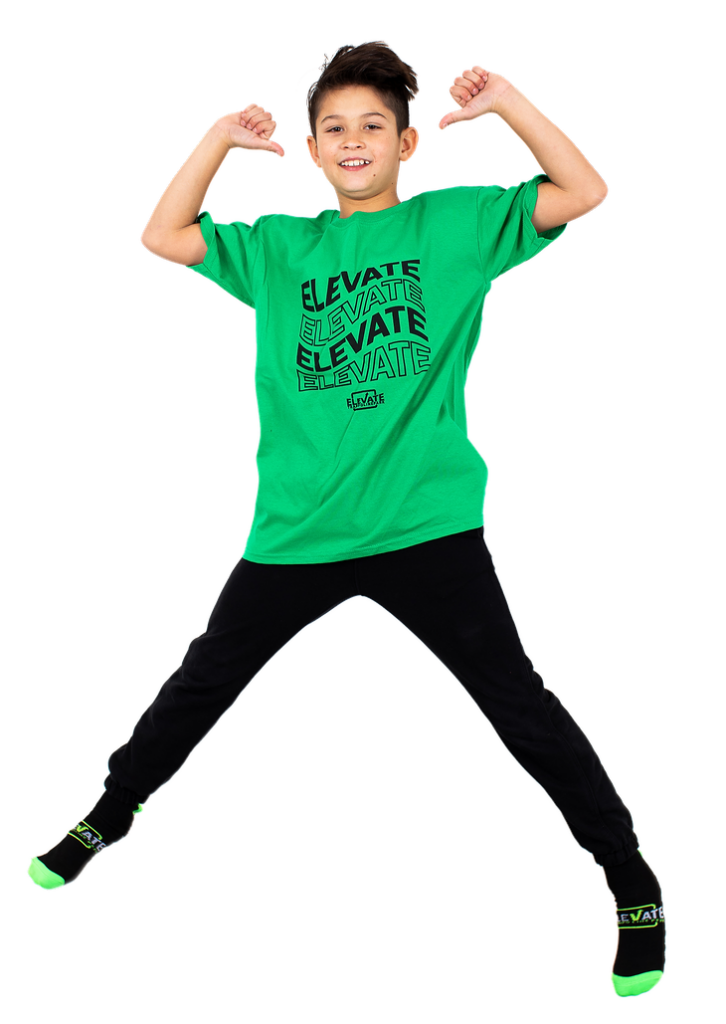 happy boy jumping and pointing at himself