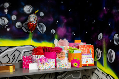 birthday presents lined up on the table at Elevate Trampoline park in East Peoria